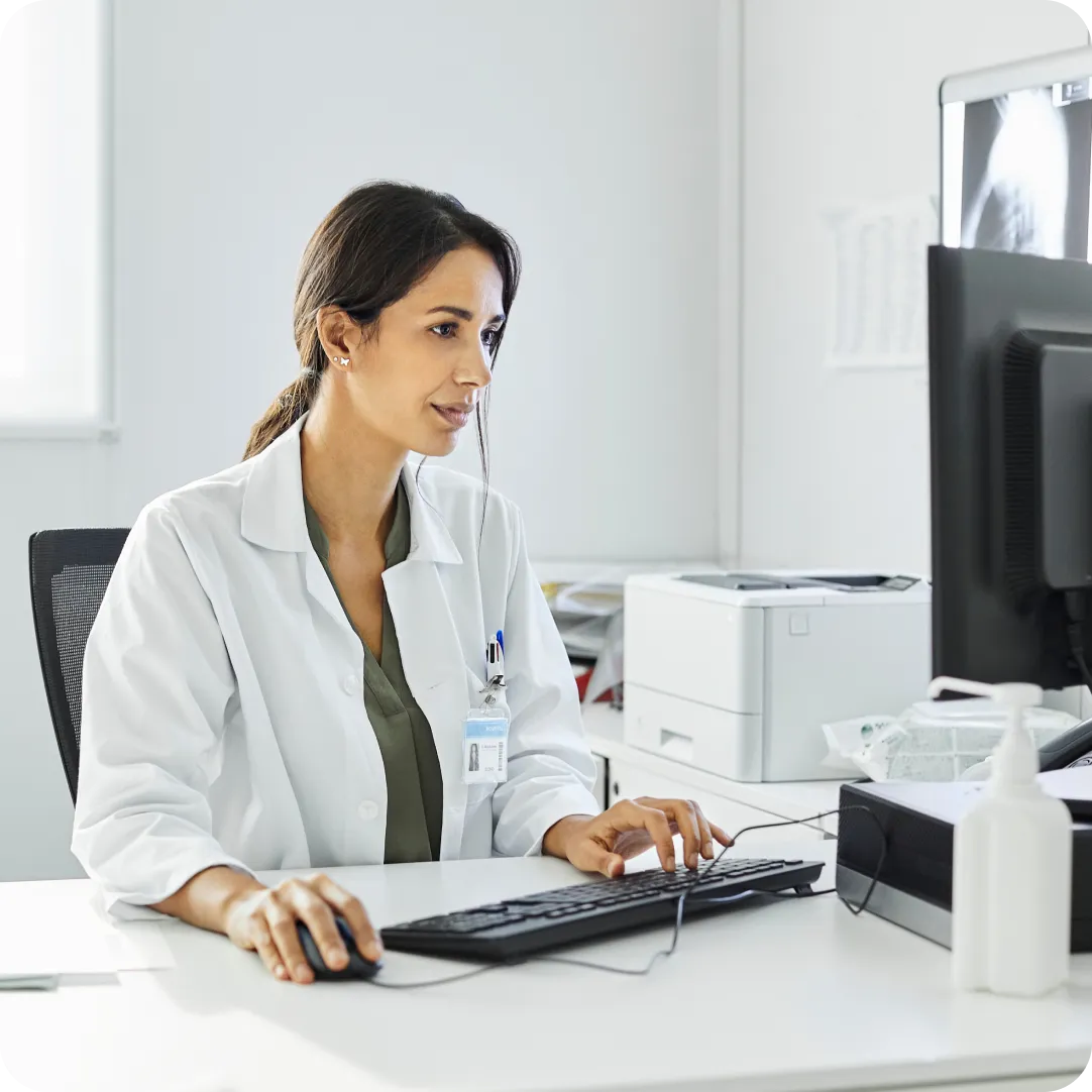 Healthcare professional using Duo and showcasing compliant identity security in the healthcare space.